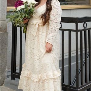 Maxi Length Dress is Cream-colored eyelet lace fabric with lining, long sleeves
